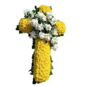 Sympathy Yellow cross arrangement with white roses on the center