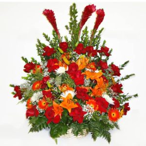Bouquet in a basket with 24 Roses, 3 Gingers, 3 Lilies, 5 White Spyder Flowers, 8 Gerberas, Baby Breath.