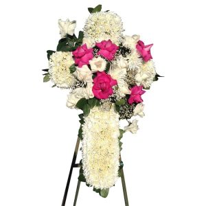 Sympathy floral arrangement white cross with pink and white roses on the center