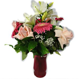 Flower in a vessel with 4 Pink Roses, 1 Lily, 4 Gerberas.