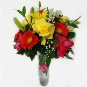 Flower in a vessel with 4 Pink Roses, 3 Yellow Roses, 2 Lilies, 4 Gerberas