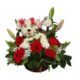 basquet of flowers with a dog in the middle made it with flowers