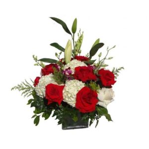 Vase bouquet with 24 Roses, 4 Orchids, 7 Flowers, 3 Lilies, Solidago, Lemon Leaves.