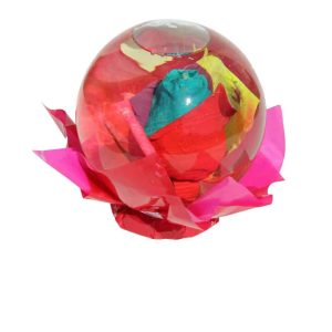 Multicolor rose inside a spheric bubble of glass filled out with water