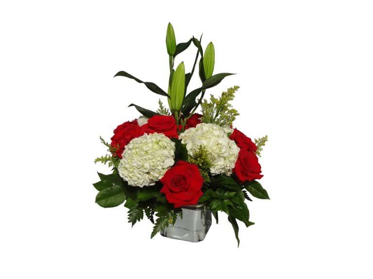Flowers vessel with 12 Roses, 4 Flowers, 3 Lilies, Solidago, Lemon leaves.