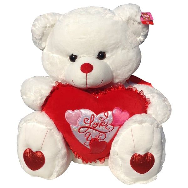 White teddy bear with a heart that said I Love You
