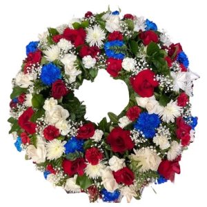Funeral Arrangement ROUND WIRH BLUE, RED AND WHITE FLOWERS, GREEN PLANTS