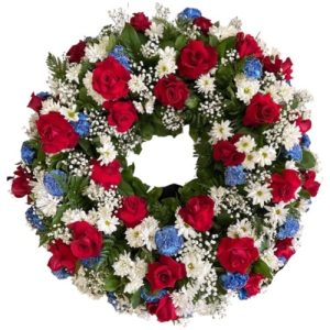 Funeral Arrangement red, blue and white flowers with green