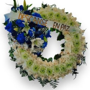 Funeral Arrangement ROUND WITH WHITE LIGHT YELLOW AND BLUE FLOWERS